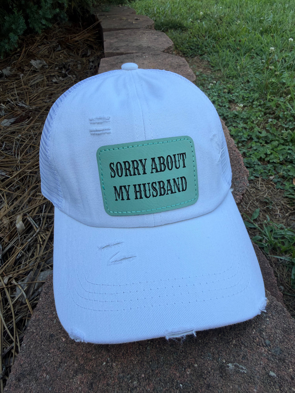 Engraved Sorry About My Husband Women's Ponytail Hat: White / Teal