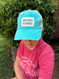 Engraved Sorry About My Husband Women's Ponytail Hat: Teal / White